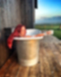 The Black Hut, Northumberland. Cabin holiday. Red Shepherdess. Outdoor Bath
