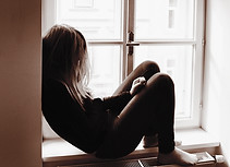Woman on Window Sill