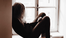Woman on Window Sill