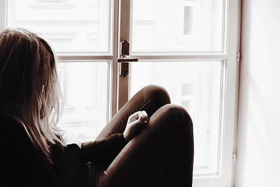 Woman on Window Sill