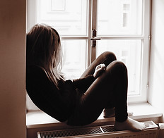 Woman on Window Sill