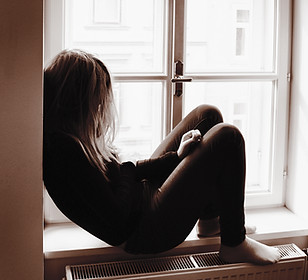 Woman on Window Sill