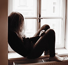 Woman on Window Sill