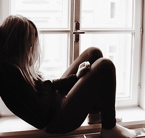 Woman on Window Sill