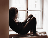 Woman on Window Sill