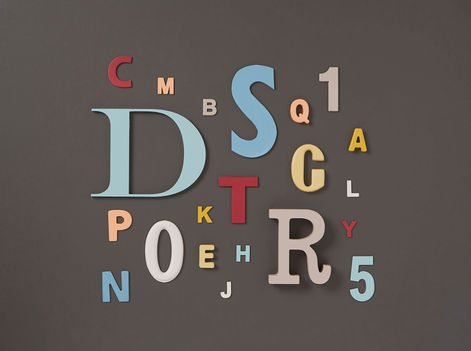 Vintage letters painted to create an interesting colour palette