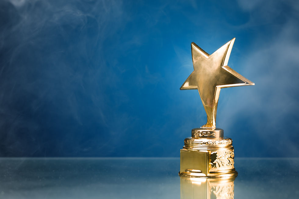 gold star trophy in smoke, blue backgrou