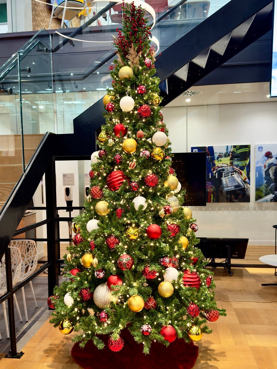 Office Christmas tree positioned to keep a Surrey reception entrance clear