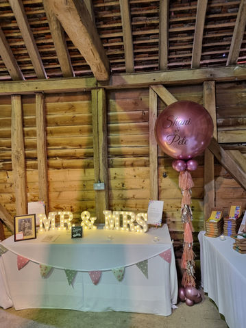 Giant Wedding Balloons with tassels, delivered to the venue by Confetti Party, party balloon shop in Guildford