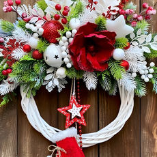 White Christmas wreath with red accent