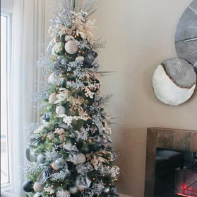Silver and White Christmas Tree decorating near Woking