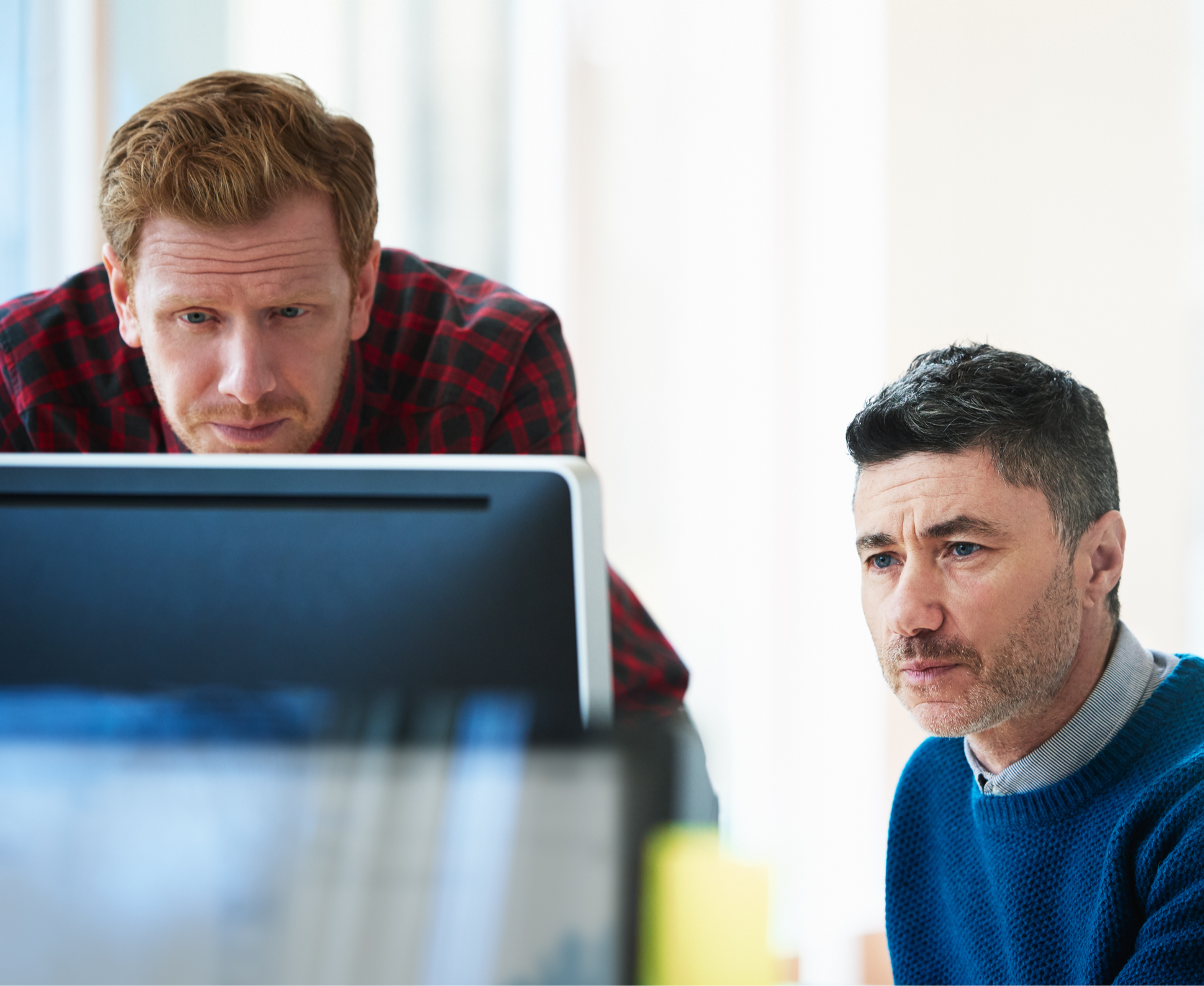 IT support specialist installing and configuring technology systems for business operations.