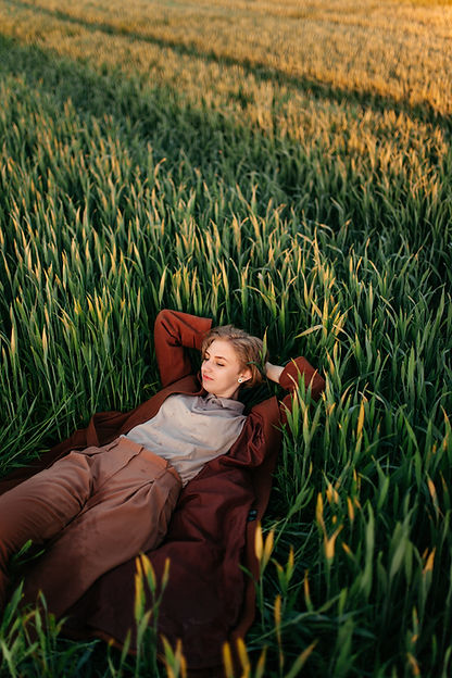Woman Laying in Field