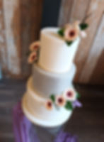 white and silver glitter wedding cake