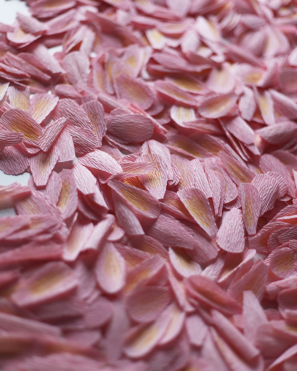The petals are hand cut and given a yellow blush. A subtle detail that gives so much depth to the flower!