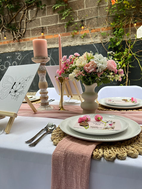 Close‑up of elegant floral décor from a 25th birthday dinner by A Series of Events by KC.