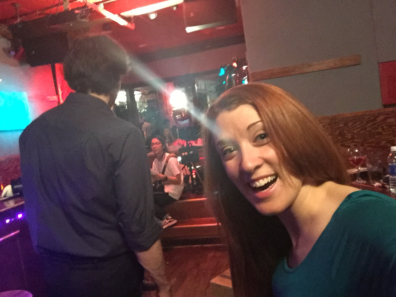 Emma Stoning up in this sweaty bar