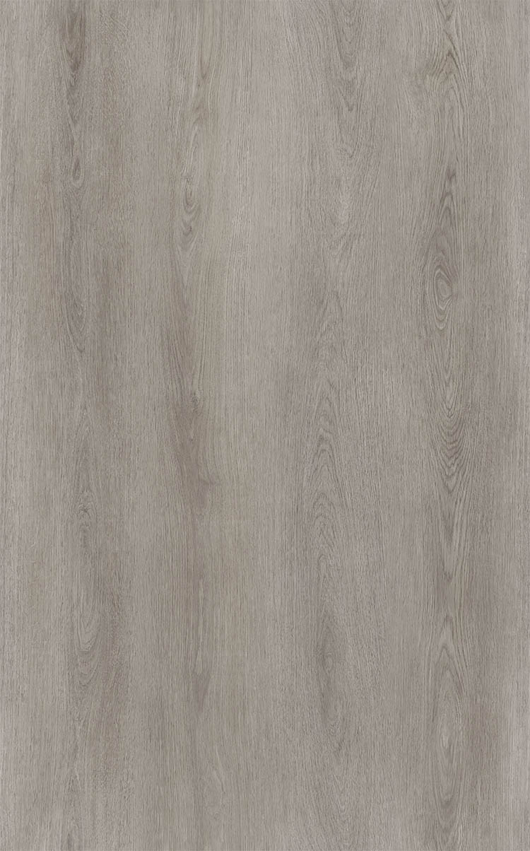A medium grey oak effect wood floor in plank design