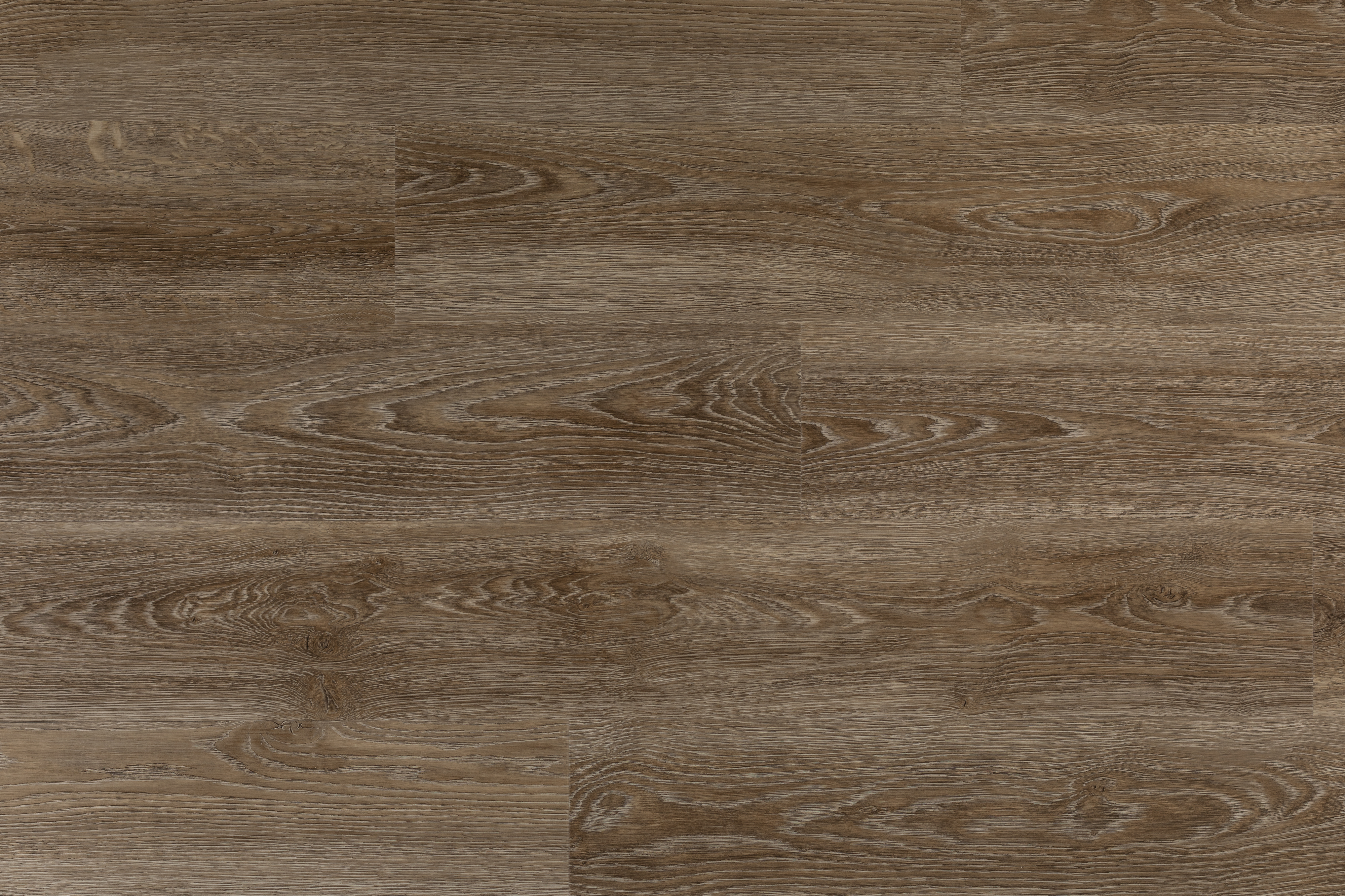 A multi-tonal wood effect floor in a plank formation