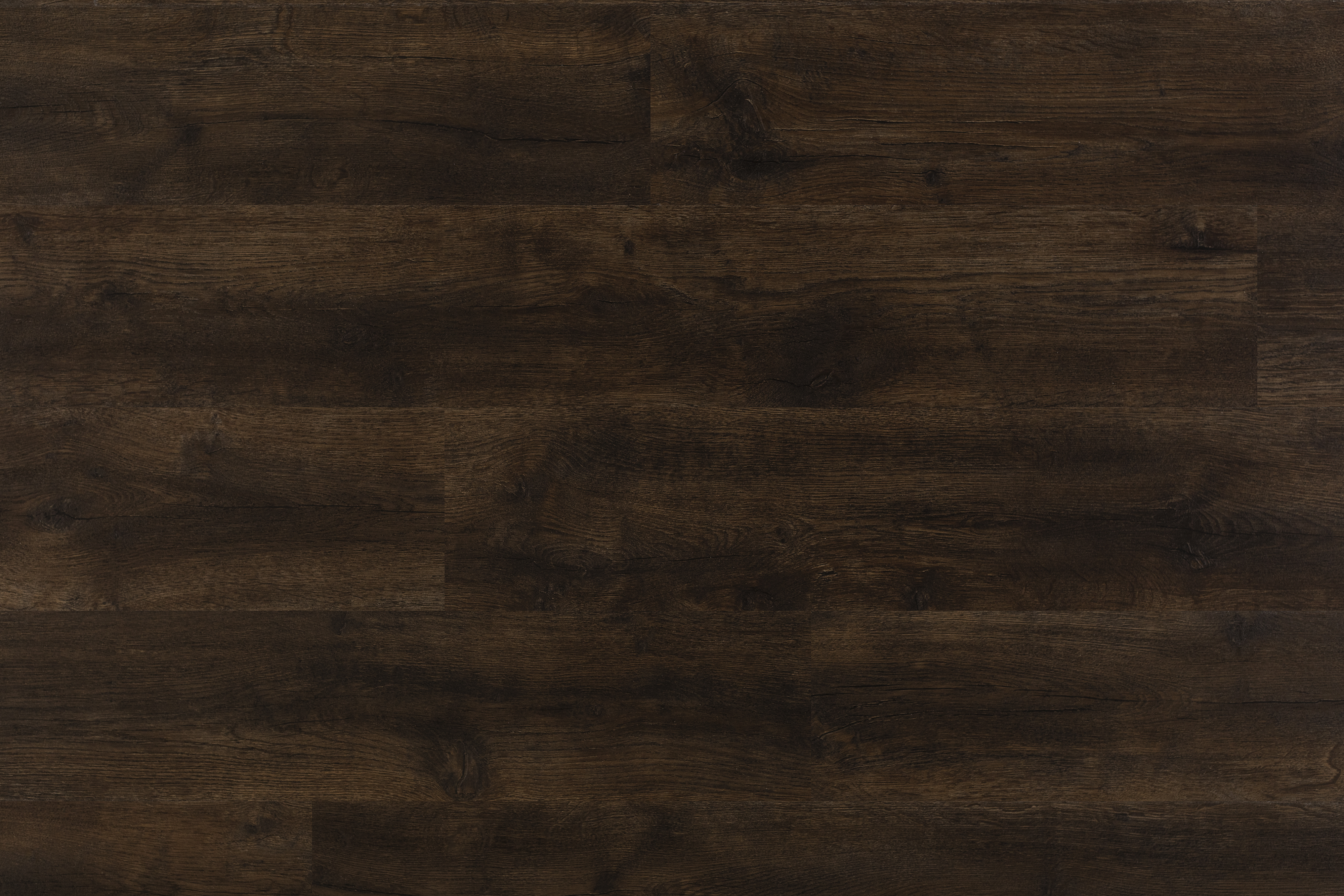 A very dark, rich wood effect floor in a plank pattern