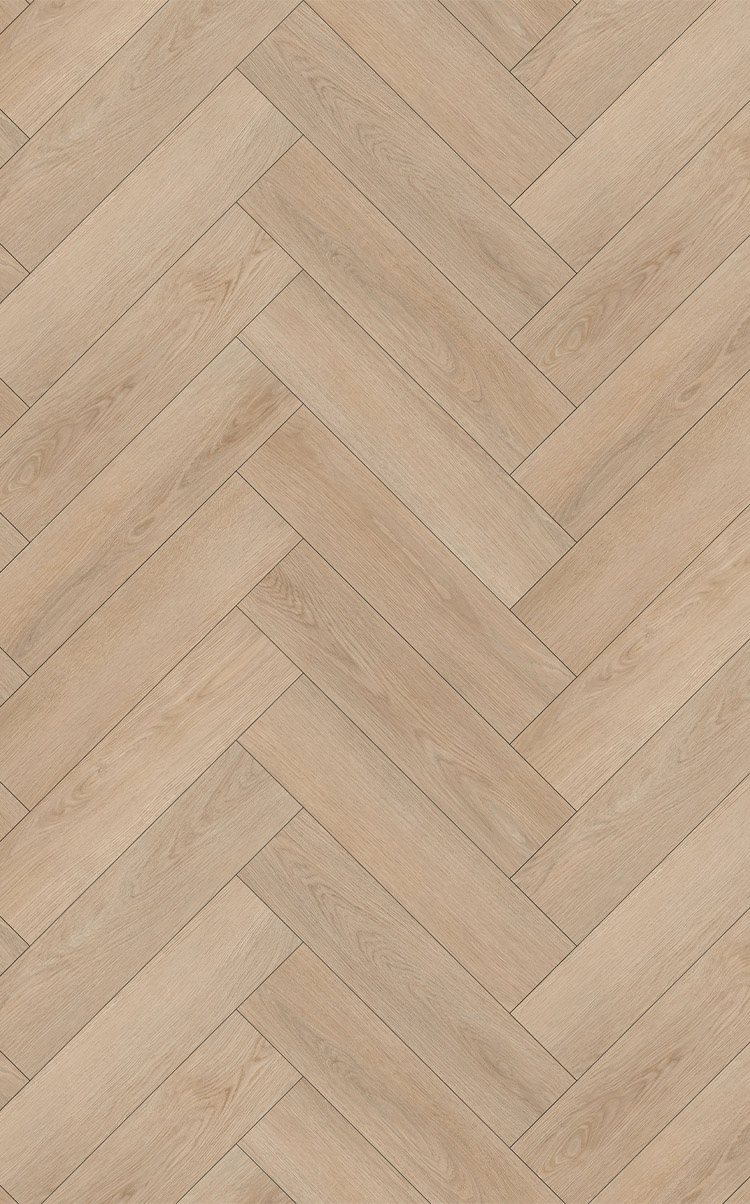 A light, white washed oak floor in herringbone design