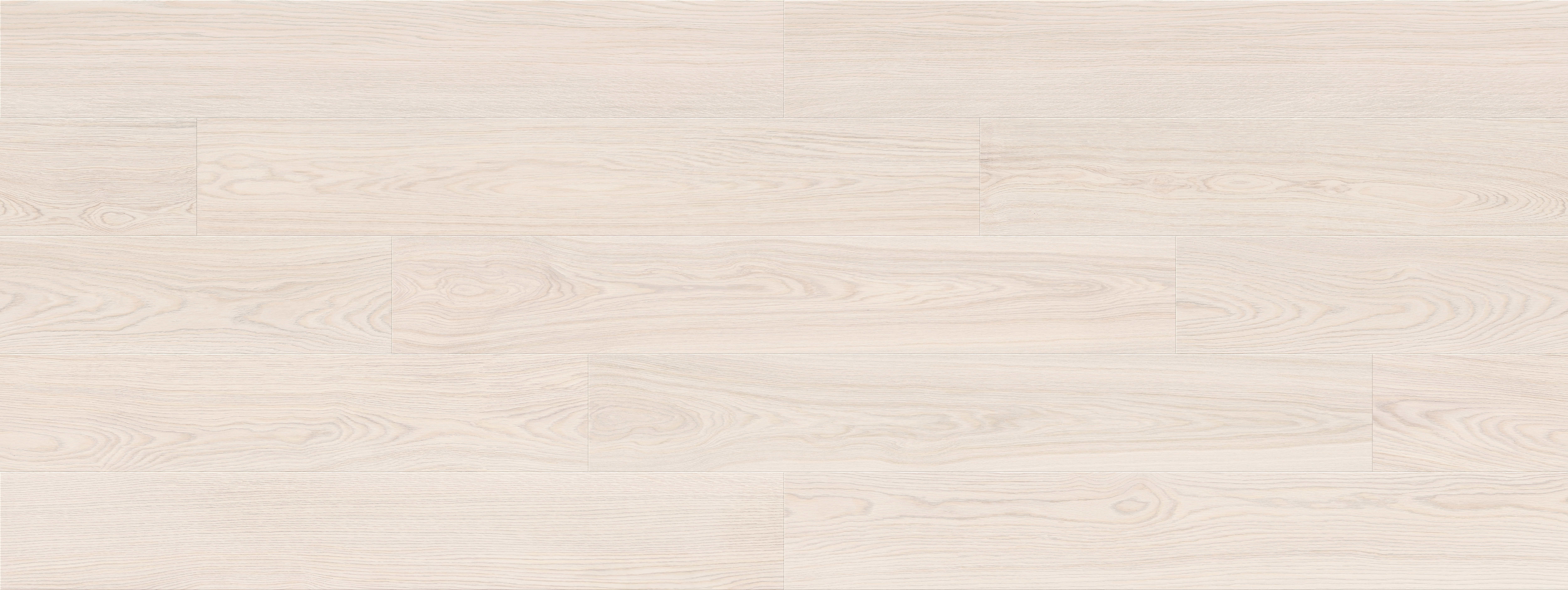 A light, white/grey washed wood effect floor in a plank pattern