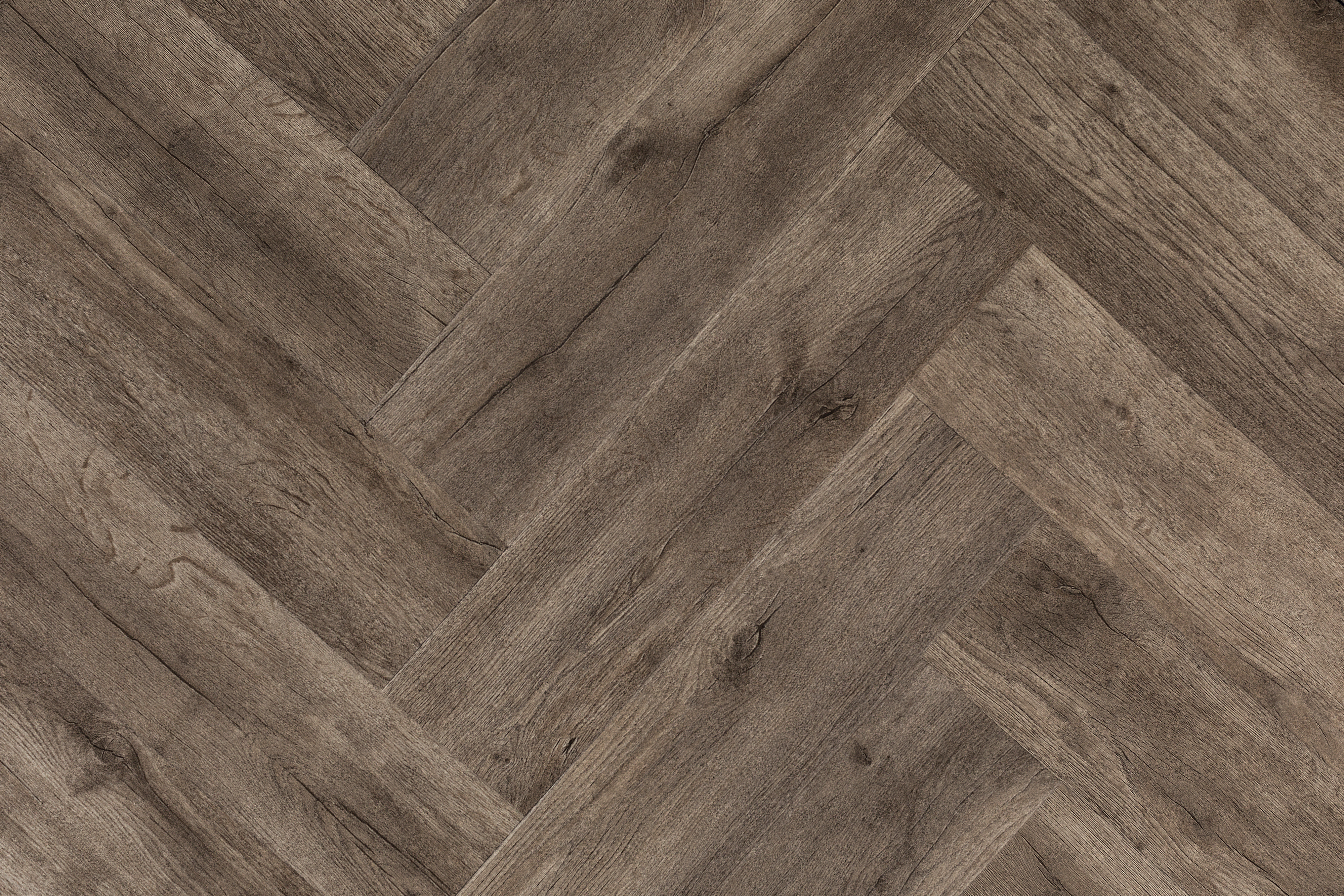A multi-tonal wood effect floor in a herringbone formation