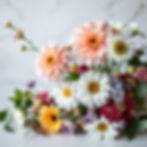 seasonal arrangemennt of flowers.jpg