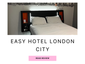 Easy hotel london city wheelchair accessible bedroom with black and orange london skyline drawing