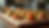 Eye-level view of a wooden serving board with an assortment of colorful appetizers