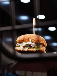Bison burger with caramelized onions.