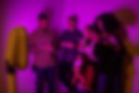 Make The Moment - Friends using photobooth at a party