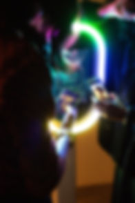 Make The Moment - Group of people using photobooth at an event