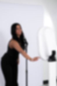 Make The Moment - Young lady using photo booth at a work event