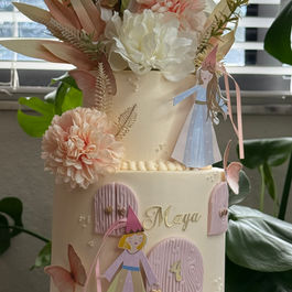 Two-tiered cake with flowers and princess design, 