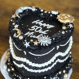 Heart-shaped black 50th custom cakes Davie FL