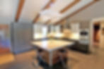 Modern kitchen with zebrawood island.