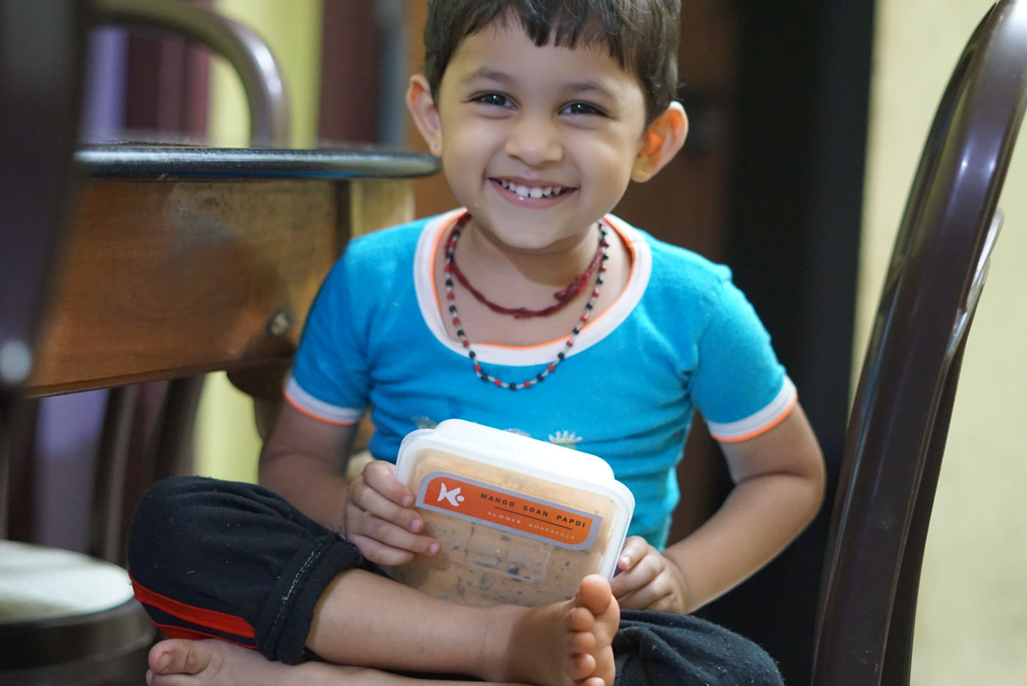 Cute kid with Kaamik snacks