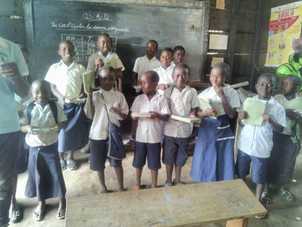 kids with new school supplies.jpeg