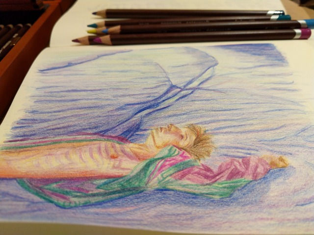 person lying down in the water