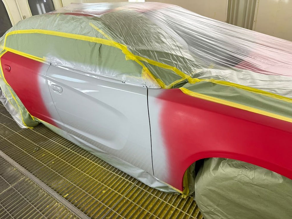 Dodge Charger primed and masked in spray booth for seamless blend in Tucson