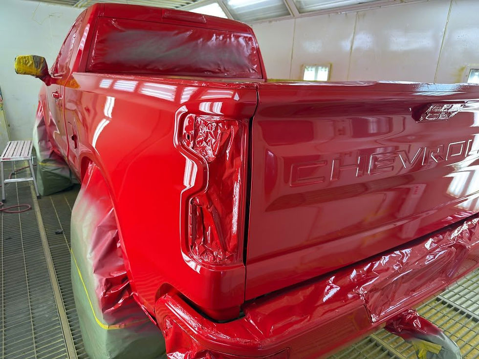 Chevy truck fresh out of the paint booth with glossy red finish in Tucson, AZ