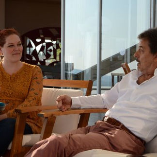 a woman and a man sitting