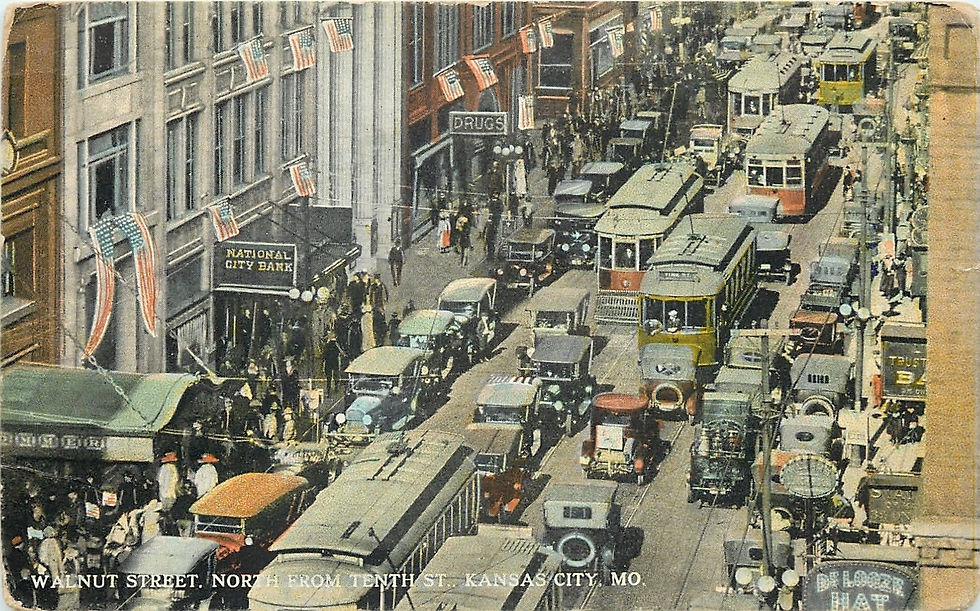Early twentieth-century public-domain postcard view of Walnut Street in Kansas City looking north from 10th Street