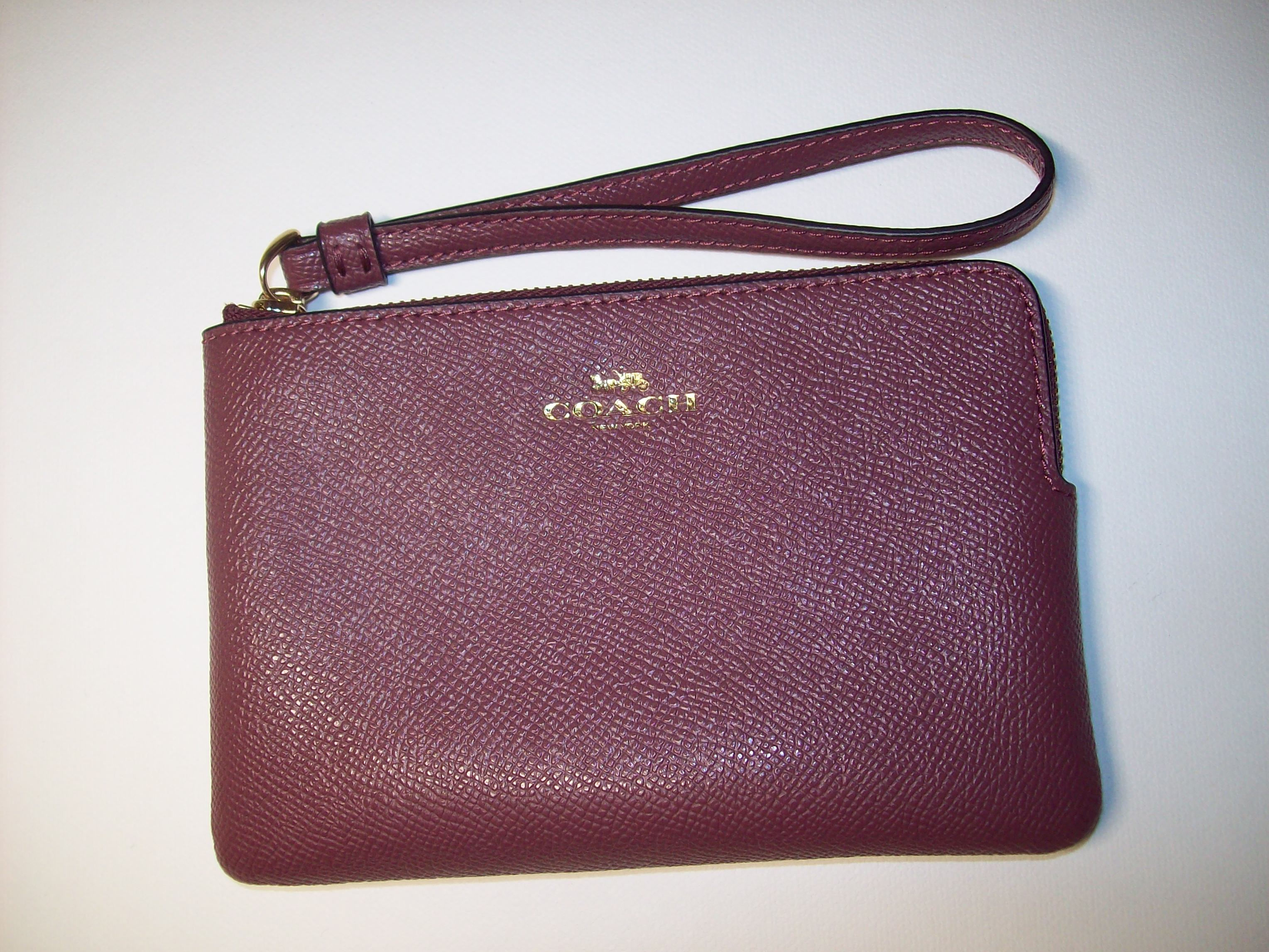 Mauve Coach Wristlet