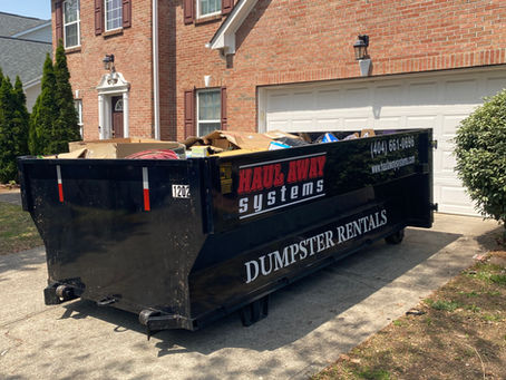 12 yard dumpster being used for home cleanup