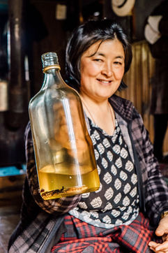 In this bottle of alcohol is a few strings of cordyceps that could improve one's immunity and keep the body warm from the cold weather of Bhutan.