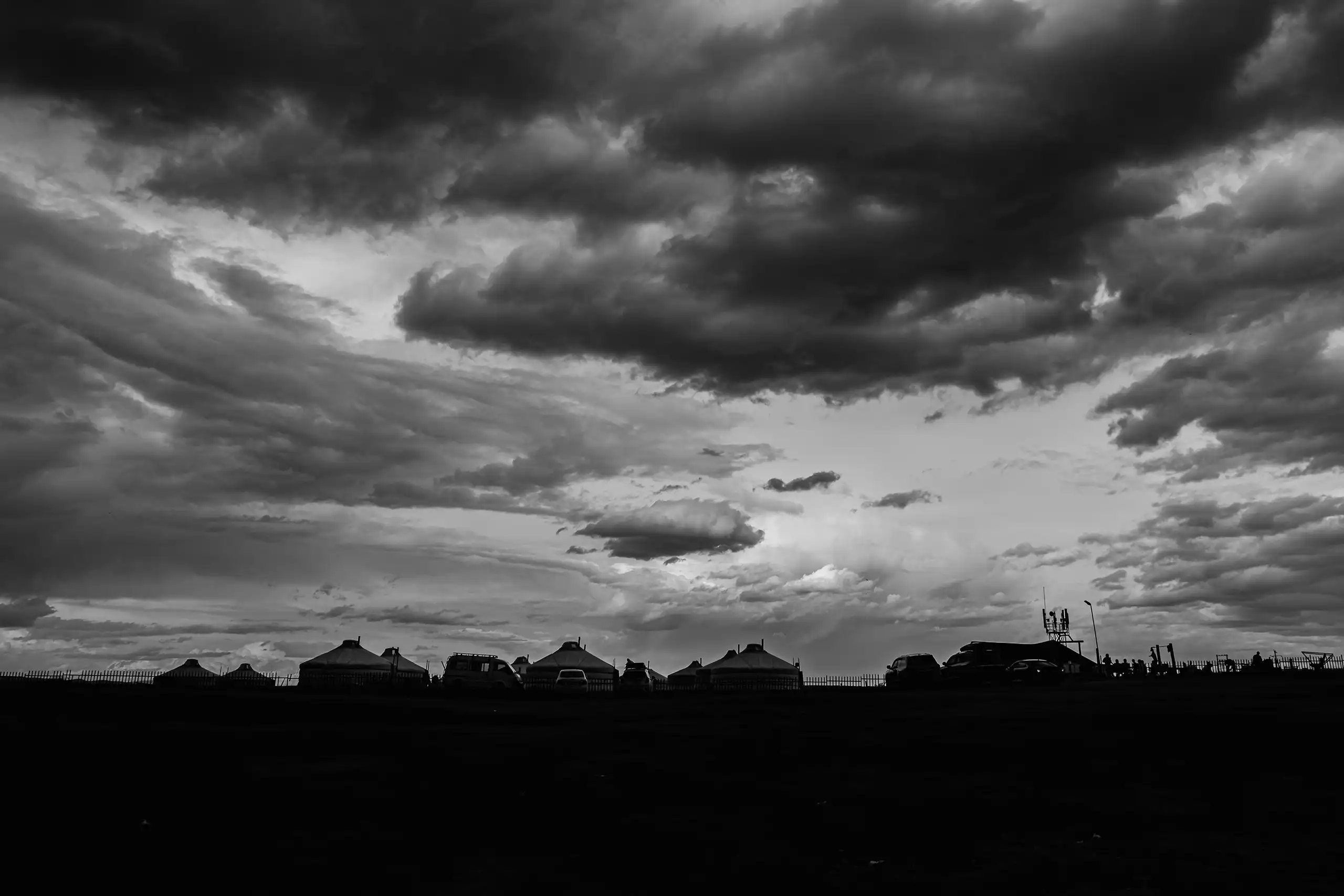 Massive stormy clouds brewing above the yurt camp in Central Mongolia