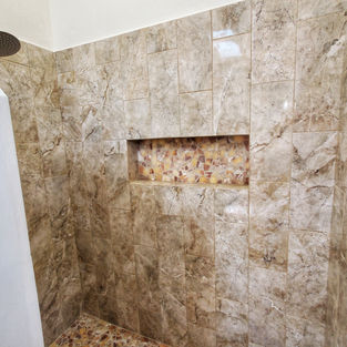 Luxury walk in shower with rainfall shower head.