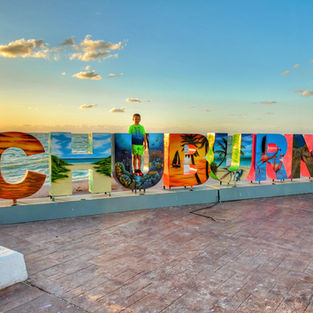 Chuburna pier with Chuburna sign.